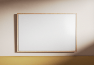 Framed white canvas on a beige wall