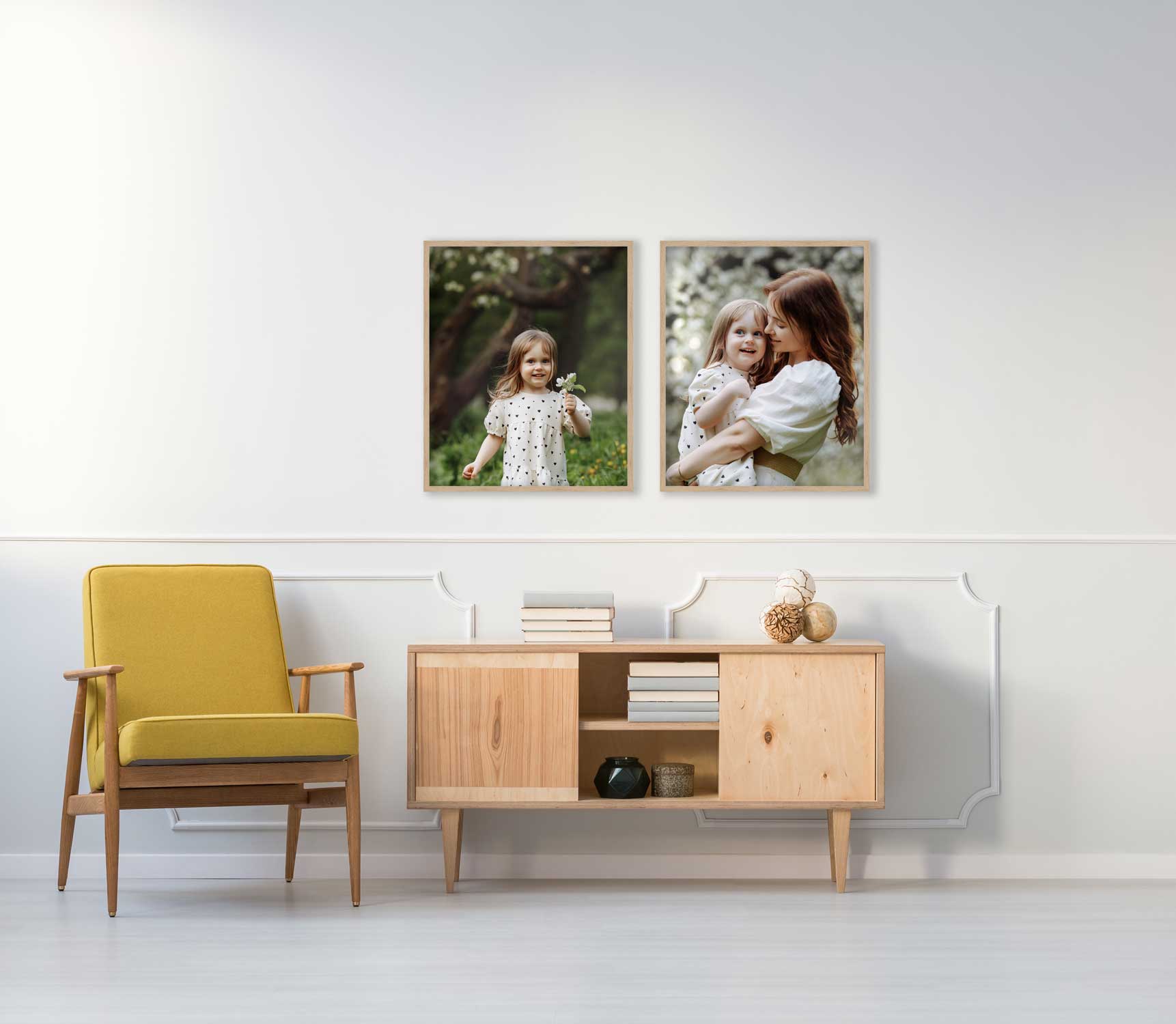 Living room with framed mother-daughter photos above a wooden console.
